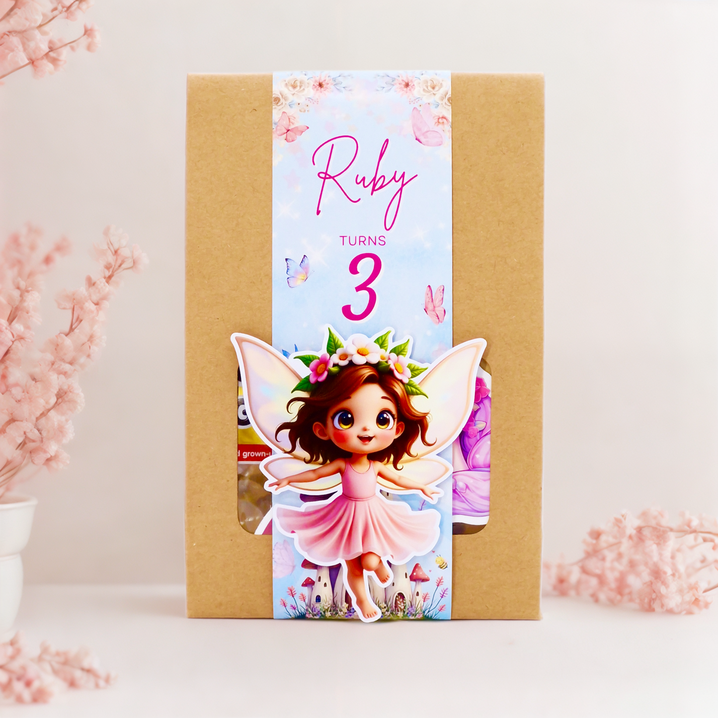Party bag with a fairy-themed birthday card featuring the name 'Ruby' and age '3'.